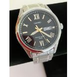 Gentlemans CASIO QUARTZ WRISTWATCH MTP 1377. Day/Date model finished in stainless steel silver tone,