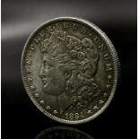 An 'About Uncirculated’ Key Date 1884 New Orleans Mint Silver Morgan Dollar. Very Nice Toning, 26.82