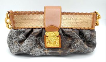A Louis Vuitton Dentelle 'Kristen' Bag. Monogram leather exterior with intricate lace detailing.