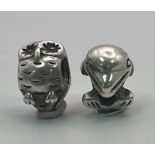 Two Sterling Silver Pandora Charms of an Owl and a Dolphin. 8.4g total weight.