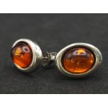 A Vintage Pair of Sterling Silver Amber Cabochon Stud Earrings. Set with 1.1cm Length Oval Cut