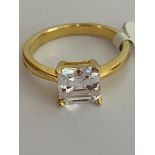 1 Carat Clear Gemstone, Princess Cut and Mounted in a SILVER RING. Ring has been gilded to appear as