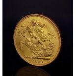 An 1887 Queen Victoria 22k Gold Full Sovereign. EF but please see photos