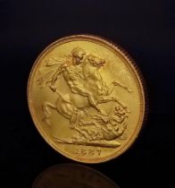 An 1887 Queen Victoria 22k Gold Full Sovereign. EF but please see photos