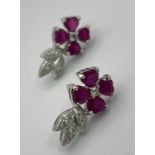 A PAIR OF 18K WHITE GOLD DIAMOND & RUBY SET DROP EARRINGS FLORAL DESIGN, WEIGHT 4.6G AND 23MM LONG