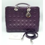 A DIOR LADY DIOR PURPLE VIOLET LAMBSKIN WITH SILVER HARDWARE BAG. A SECURE ZIPPED TOP WITH CD