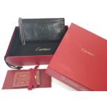 A Cartier Black 'Marcello de Cartier' Clutch Bag. Leather exterior with the Cartier logo stitched,