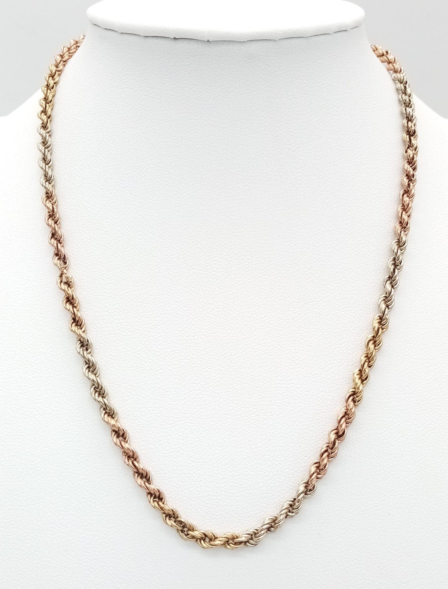 A 3 COLOURED 9K GOLD TWIST NECK CHAIN . 4.7gms 40cms