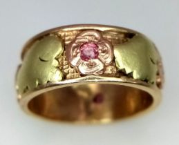 A Vintage 14K Yellow and Rose Gold (tested) Ruby Ring. Four rubies reside in rose gold floral