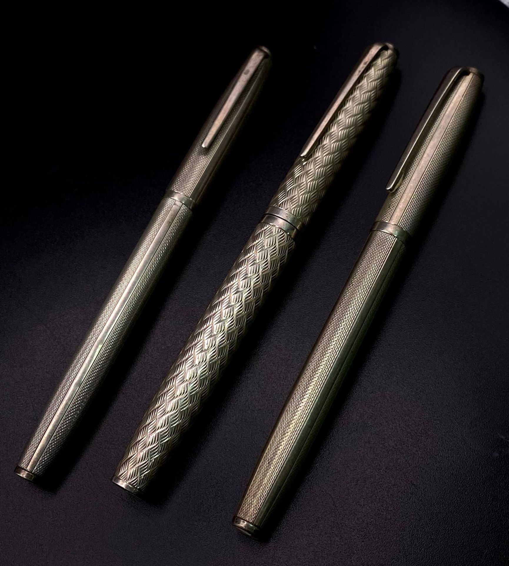 Three Sterling Silver Hallmarked Pens. All in need of refill cartridges. 63g total weight. Ref: