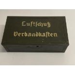 A WW2 German Luftschutz First Aid Box with Accessories - It has its original label inside. ML282