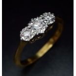 A Vintage 18K Yellow Gold Three Stone Diamond Ring. Size K. 1.92g total weight.