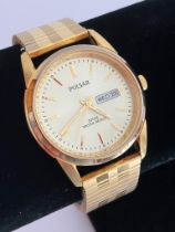 Gentlemans PULSAR QUARTZ WRISTWATCH VJ33-X004. Day/Date model. Finished in gold tone. Water