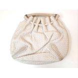 A BOTTEGA VENETA SOFT CREAM LEATHER HOBO BAG. COMES WITH INTERIOR ZIPPED COMPARTMENT AND PHONE