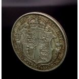 A 1916 George V Halfcrown Silver Coin. S4011. Please see photos for conditions.