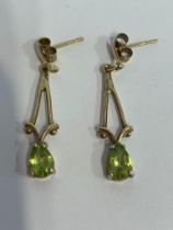 Stunning Pair of 9 carat GOLD and PERIDOT EARRINGS. Drop style having attractive Gold openwork