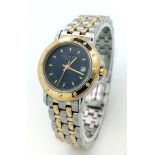A Raymond Weil Ladies Tango Bi-Colour Quartz Watch. Bi colour steel strap and case - 28mm. Blue dial