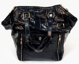 A Yves Saint Laurent Black Patent Leather "Downtown Paris" Tote Bag. It has two top handles, hand
