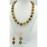 A very desirable, large beaded, Dragon’s Veins Agate necklace and earrings set. Necklace length: