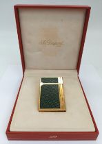 A Lovely Vintage S.J. Dupont Lighter. Gatsby gilded and lizard grained decoration. Comes with
