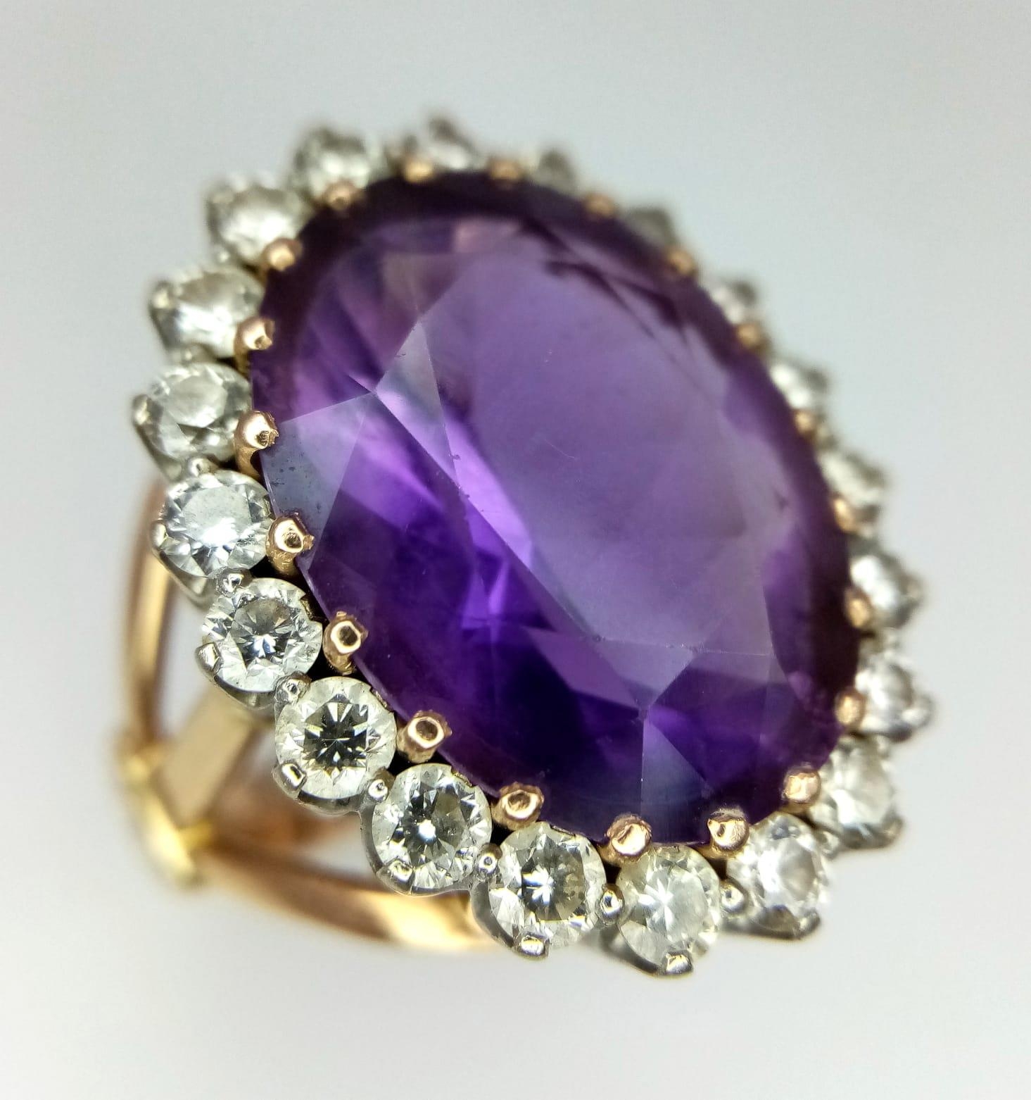 AN 18K YELLOW GOLD DIAMOND & PURPLE STONE ( BELIEVED TO BE AMETHYST ) COCKTAIL RING, WITH A LARGE - Image 2 of 6