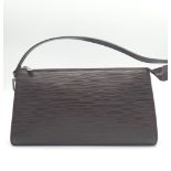 Brown LOUIS VUITTON Epi Pochette Accessoires. This stylish pochette is a finely crafted Louis