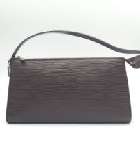 Brown LOUIS VUITTON Epi Pochette Accessoires. This stylish pochette is a finely crafted Louis