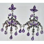 A gorgeous 14CT Amethyst set in a pair of 925 Silver Earrings. Total weight 12.9G. Come with a