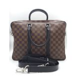 A Louis Vuitton Damier Business Bag. Damier ebene leather exterior. Rolled leather handles and trim.