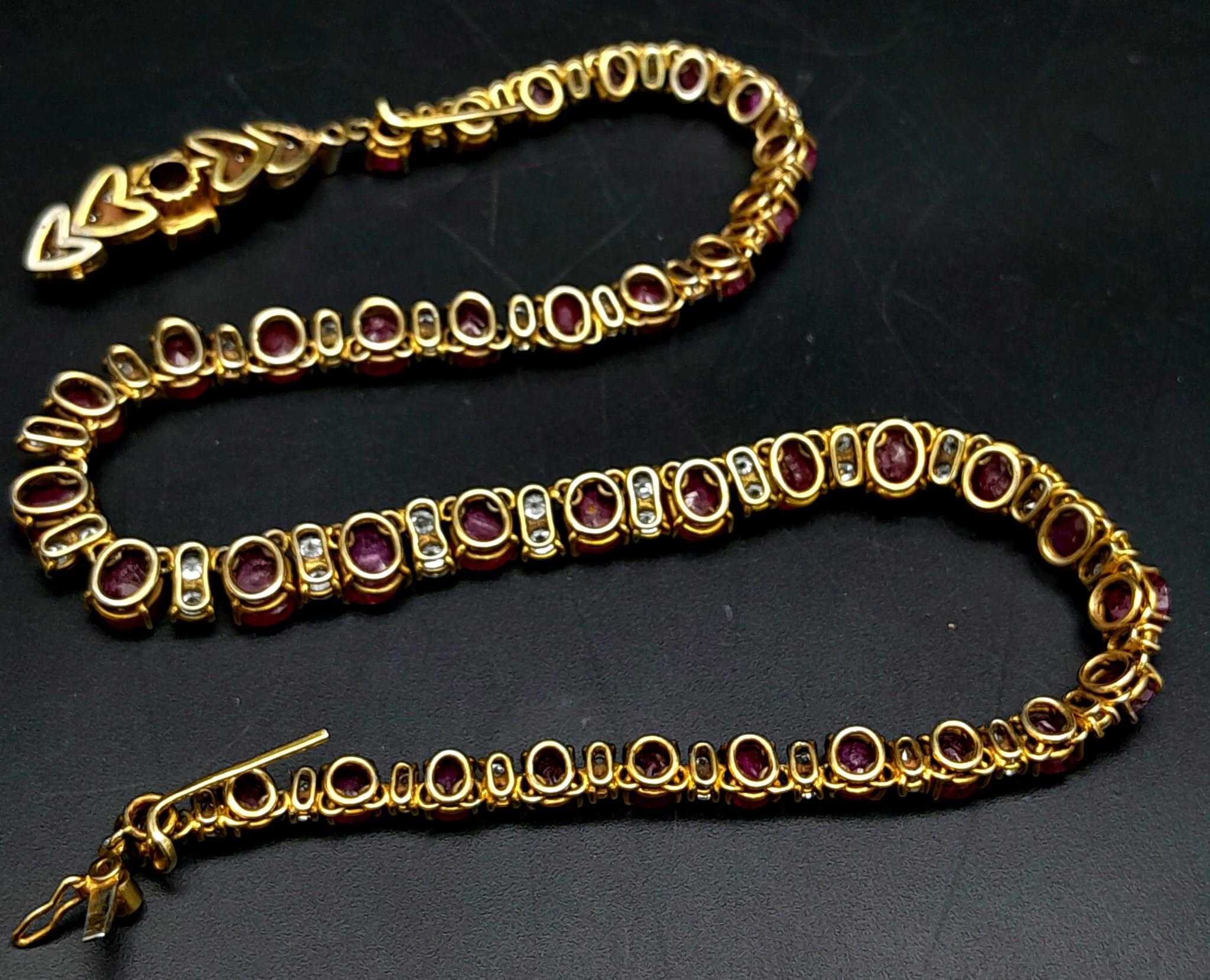 A vintage, 9 K yellow gold necklace loaded with oval cut natural rubies and round cut diamonds. - Image 8 of 10