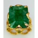 A ring with the WOW factor, a silver and gold filled ring with a fabulous emerald cut emerald (16