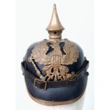 WW1 1895 Model Imperial German Pickelhaube with chinstrap and cockles. Unit marked to the 70th (