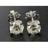 A Pair of 1ct Diamond Sut Earrings. Total Weight 2.24g