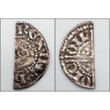 A 1248-1250 Henry III Long Cross Cut 1/2d Silver Coin. Phase II. Class 3. S1361-64.