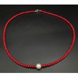 A Red Coral Small Bead Necklace with Decorative Pearl. 14k gold clasp. 46cm