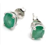 A pair of emerald stud earrings set in silver. Ref: 6824