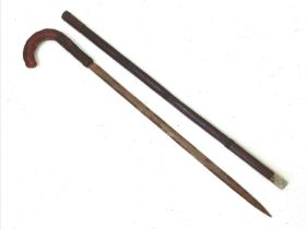 An antique Gentleman's Leather Bound Sword Walking Stick. A rare find indeed and especially in