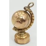 A Vintage 9K Yellow Gold Globe Charm/Pendant. 2cm. 2.37g weight.