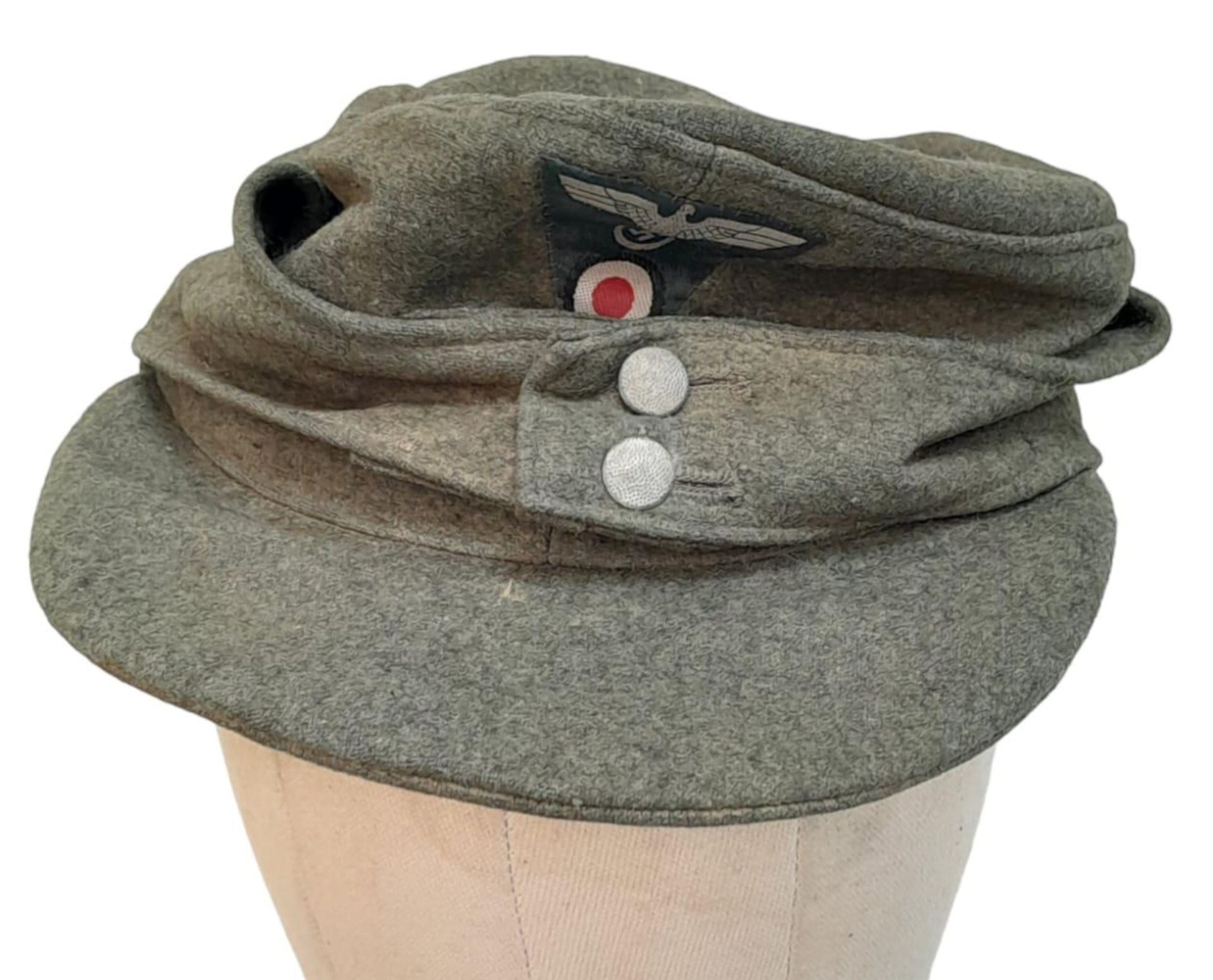 A WW2 German Heer (Army) M43 Cap with Jäger (light infantry mountain troops) Insignia.