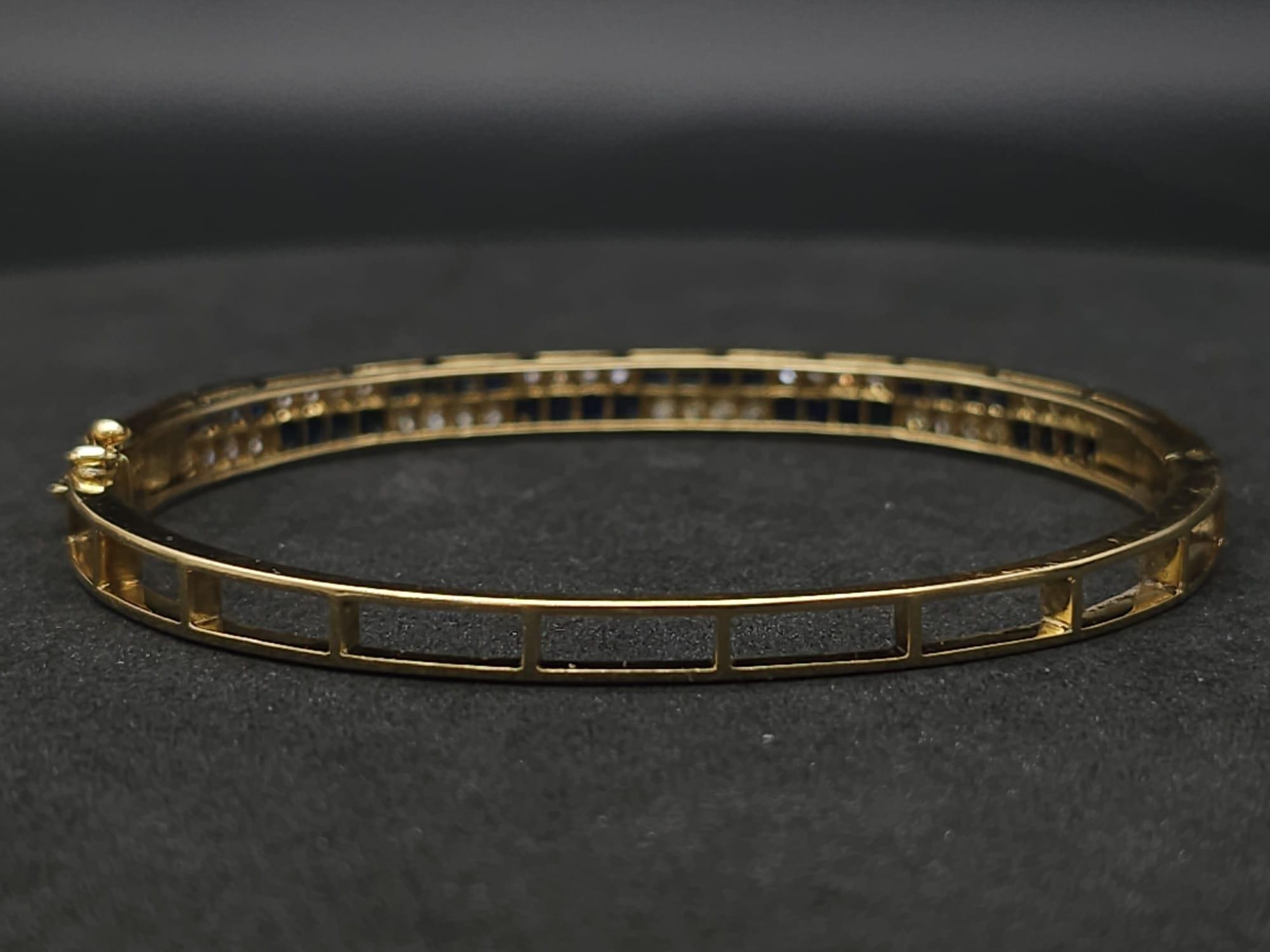 An18kt Yellow Gold Diamond & Sapphire Bangle.0.50ct Diamonds 0.65ct Sapphires W: 13.7g - Image 6 of 9