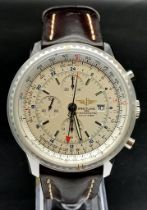 A Breitling Navitimer World Automatic Gents Watch. Brown leather strap. Stainless steel case - 47mm.