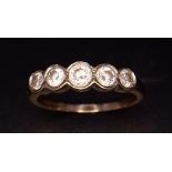 A VINTAGE 9K GOLD RING HAVING 5 DIAMONDS SET IN PLATINUM . 2.45gms size N