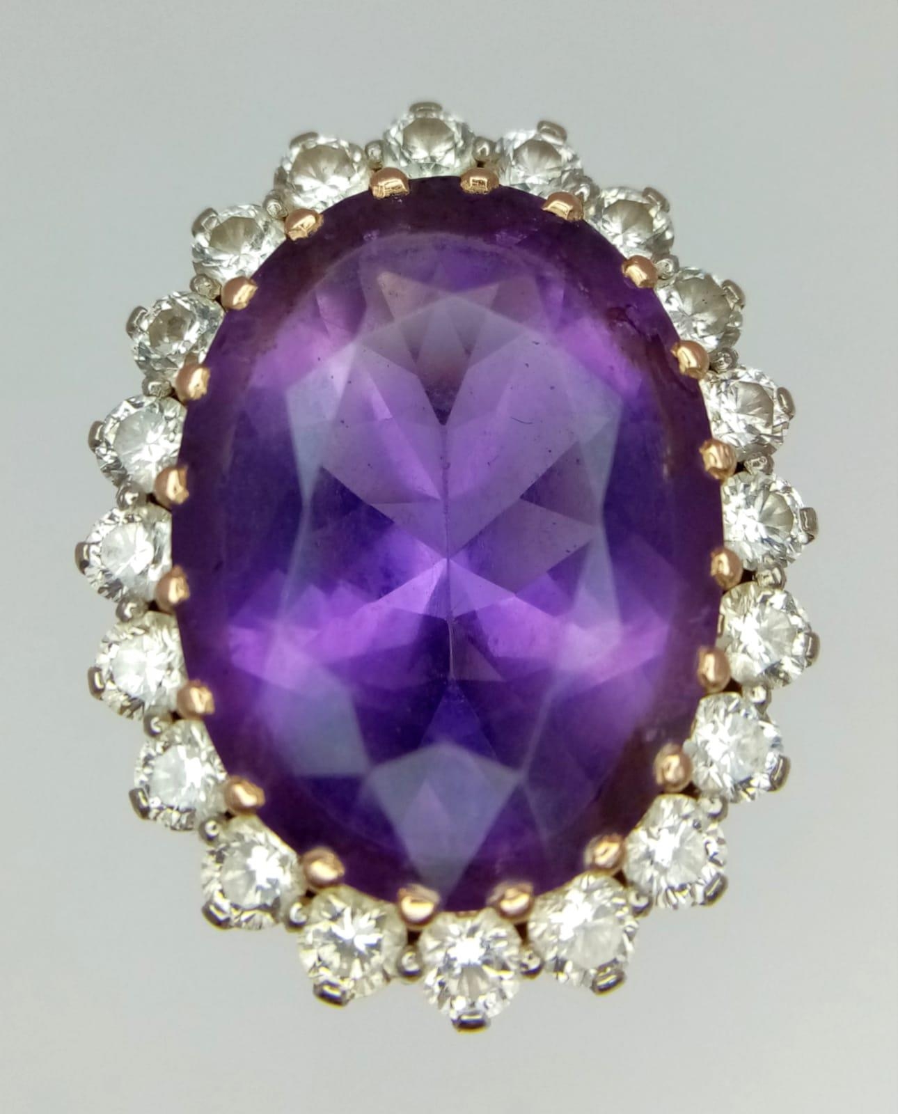 AN 18K YELLOW GOLD DIAMOND & PURPLE STONE ( BELIEVED TO BE AMETHYST ) COCKTAIL RING, WITH A LARGE - Image 3 of 6