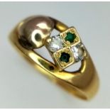 An 18K Yellow Gold, Diamond and Emerald Ring. Four stone and heart decoration. Size N. 2.68g total