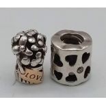 Two Sterling Silver Pandora charms flower bouquet. Engraved 'LOVE' and open work love hearts. Wt 5.