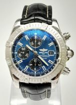 A Breitling Chronograph Automatic Gents Watch. Black leather strap. Stainless steel case - 44mm.