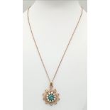 A 9 K rose gold chain necklace with pendant having a floral motif, with a central round cut