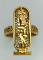 An 18 K yellow gold filigree ring with a three dimensional cartouche of Cleopatra, the most