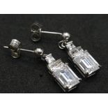 A 9k white gold CZ drop pair of earrings. 3.1g total weight.