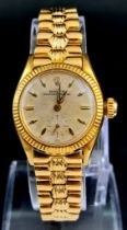 A very RARE Vintage 18K Gold Rolex Oyster Perpetual Ladies Watch. 18K gold bracelet (Rolex shell